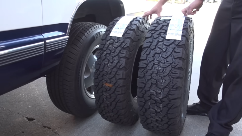 Comparison of Standard and Off-Road Tires Showing Differences in Size and Tread Patterns