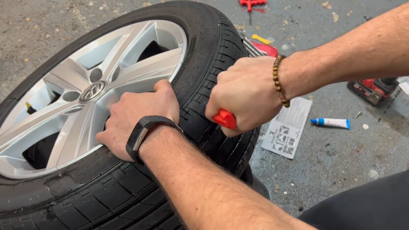 Using a DIY Patch Kit to Fix a Punctured Tire