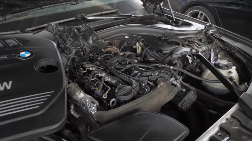 Bmw B47 Engine Partially Disassembled, Showing Components During Repair or Maintenance Work