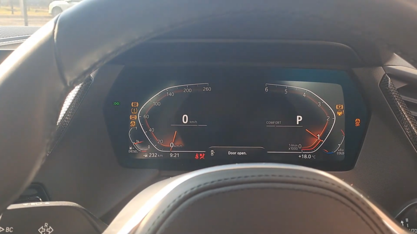 Dashboard Display of The BMW 1 Series Showing Fuel Efficiency and Performance Metrics