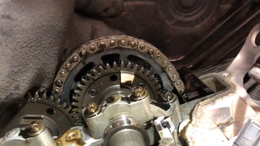 Close-Up of A BMW N47 Engine Showing a Timing Chain Failure