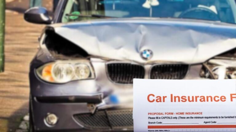 Crashed Bmw with A Car Insurance Form in The Foreground After an Accident