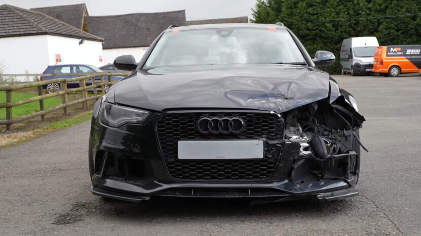 Audi RS6 damaged on the front left side