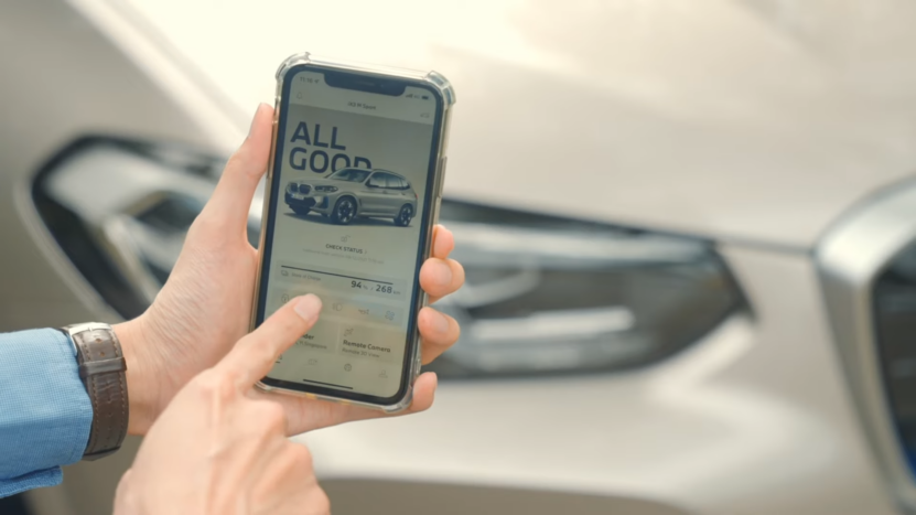 Person Using BMW Remote Services App