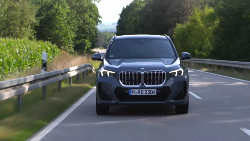 Front View of A BMW X1 Driving on A Road