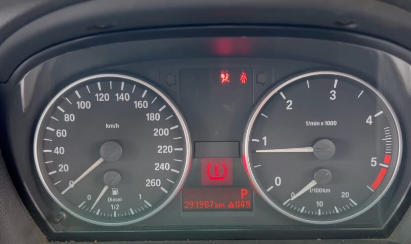 A photo showing speedometer and mileage in a car