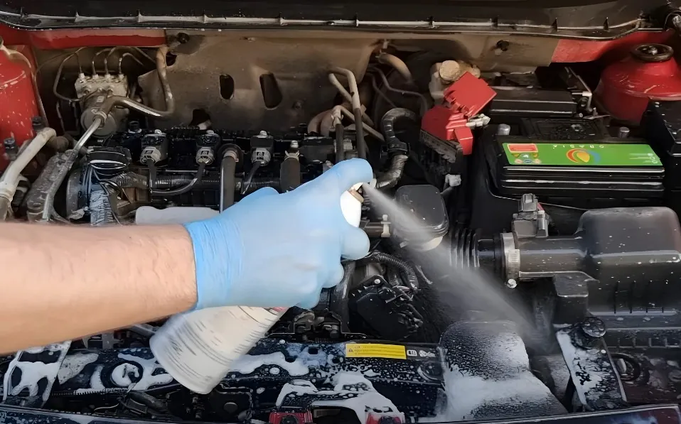 Cleaning engine with degreaser spray