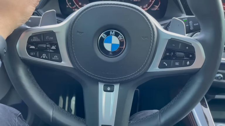 BMW Steering Wheel with Controls for Adaptive Cruise and Lane Assist, Showcasing Safety and Security Equipment Features