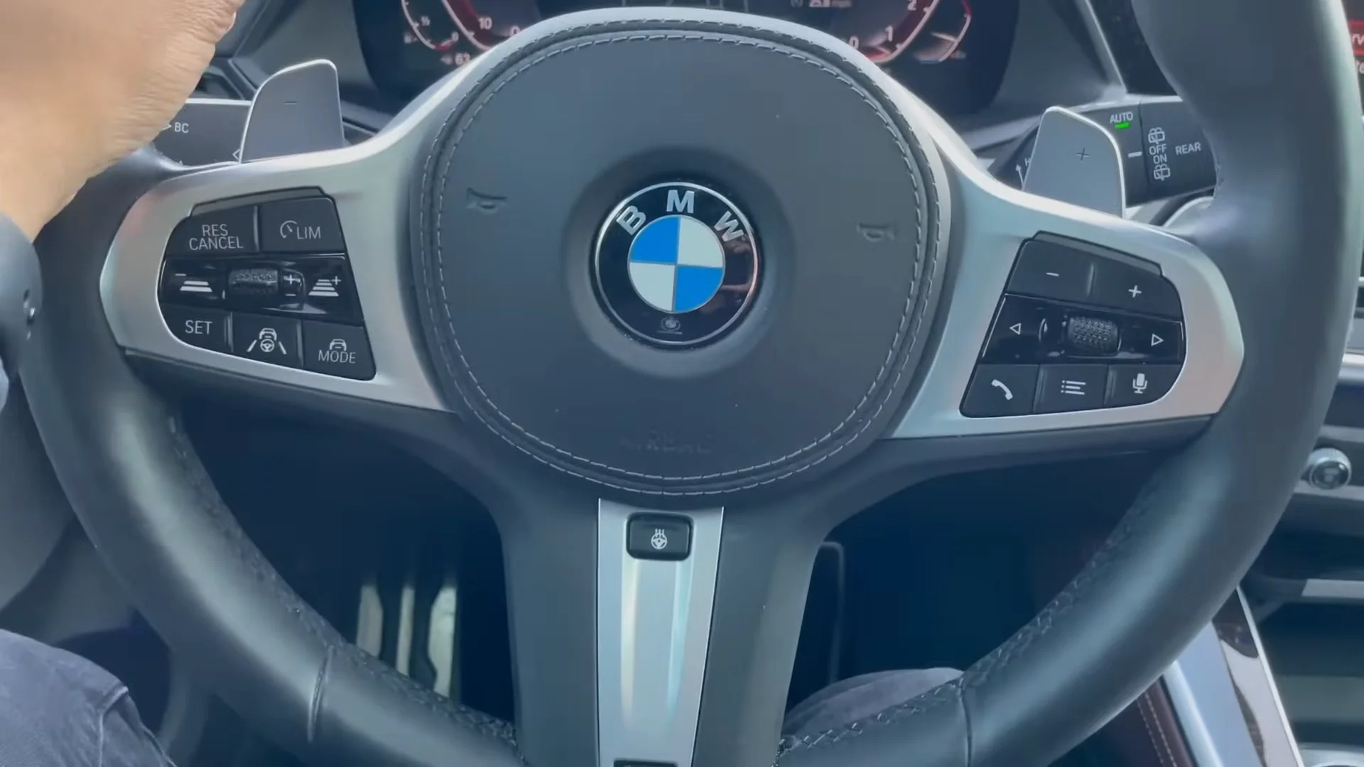 BMW Steering Wheel with Controls for Adaptive Cruise and Lane Assist, Showcasing Safety and Security Equipment Features