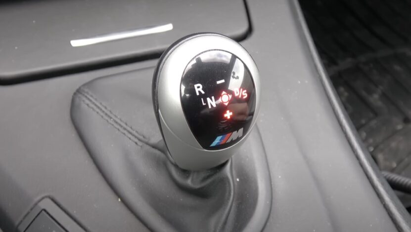 Close up photo of a silver BMW gear selector