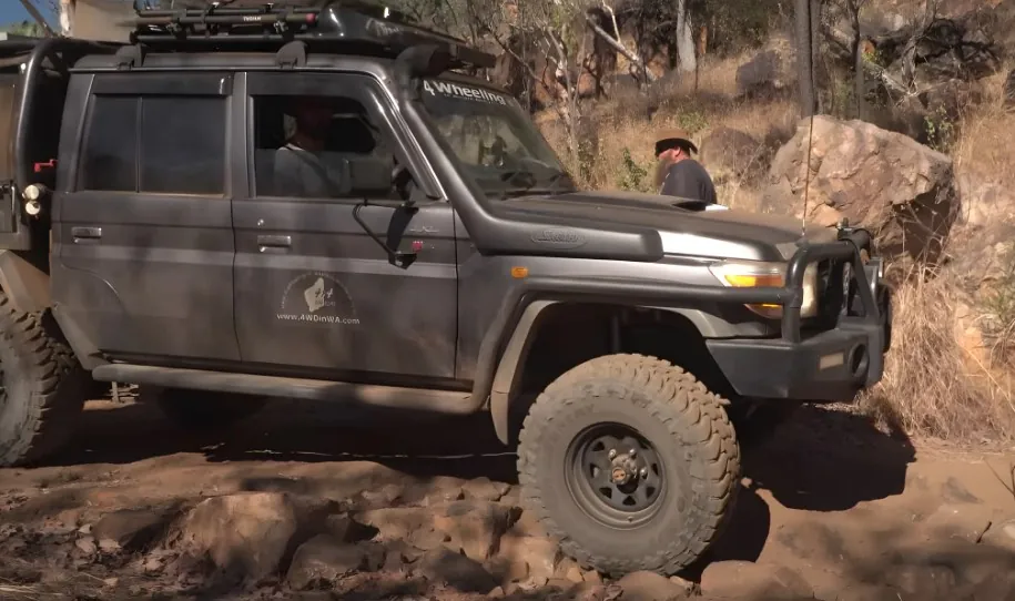 Off-road vehicle navigating rocky terrain