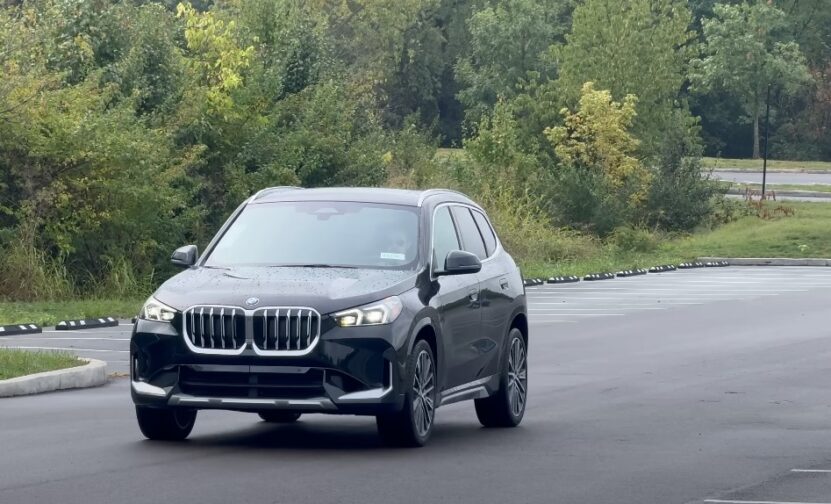 Black BMW X1 on a road