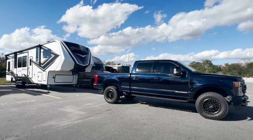 Truck towing a camp trailer